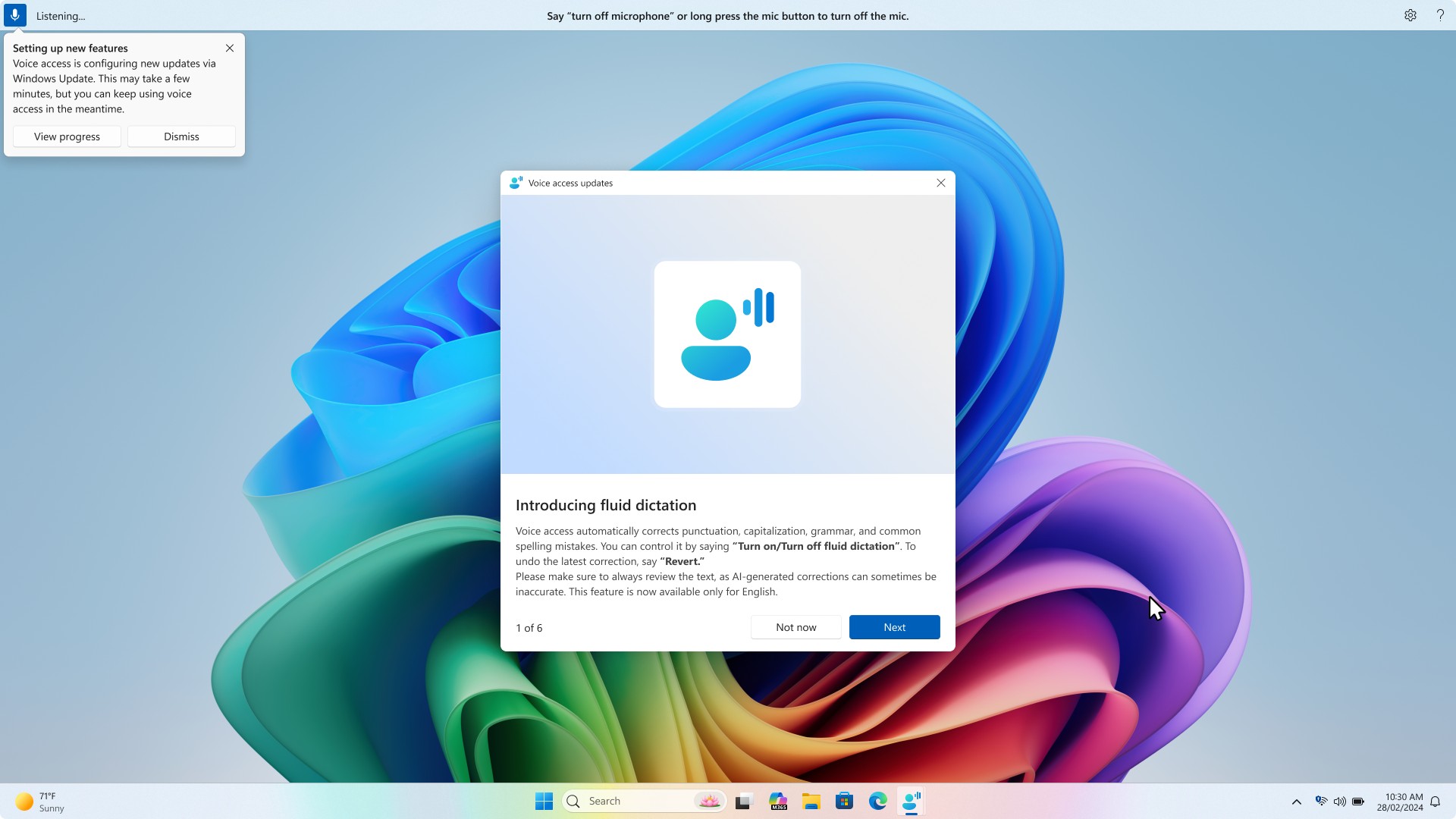 Screen showing a “Voice access updates” dialog titled “Introducing fluid dictation.”